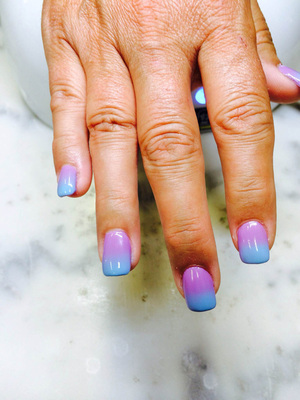 Manicured fingers in subtle hues are yours from binh's nail crafters