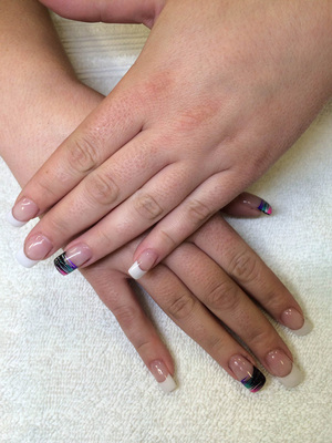 A stylish manicure with black highlights from Binh's manicure salon.
