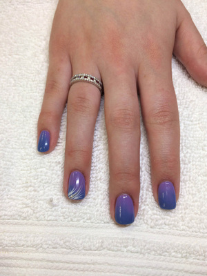 Fingers featuring shaded hues and white design accents on the third finger from Binh's