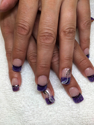 Mauve polished nails combined with glitter accents and line art, produce a stunning style from Binh's