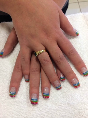 Artistically polished nails in red, white and blue make a lovely style from Binh's